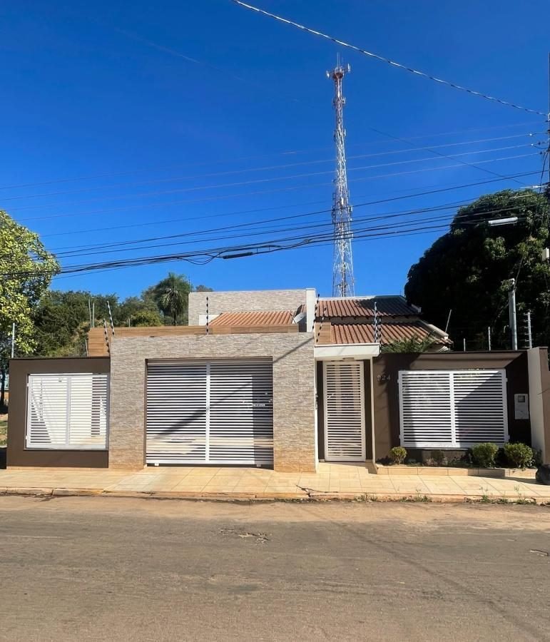 Foto 1 — Casa 4 quartos · Centro